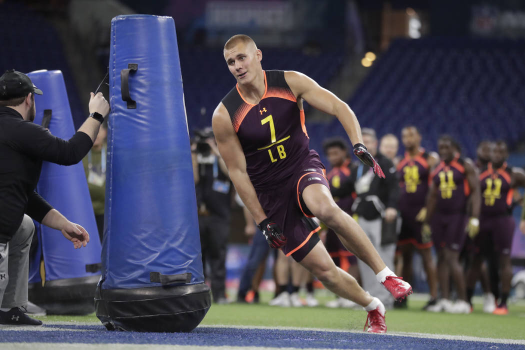 Utah linebacker Cody Barton runs a drill at the NFL football scouting combine in Indianapolis, ...