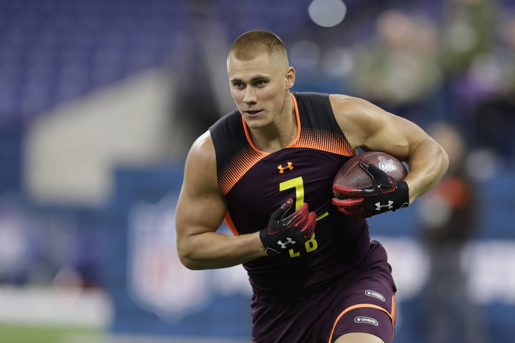 Utah linebacker Cody Barton runs a drill during the NFL football scouting combine, Sunday, Marc ...