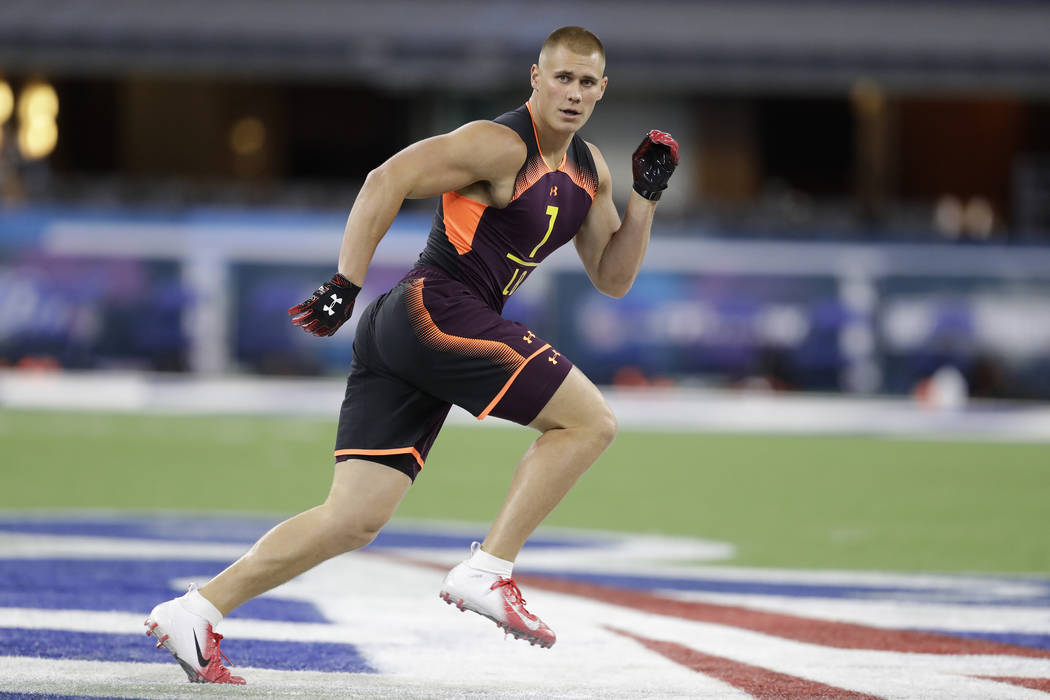 Utah linebacker Cody Barton runs a drill during the NFL football scouting combine, Sunday, Marc ...