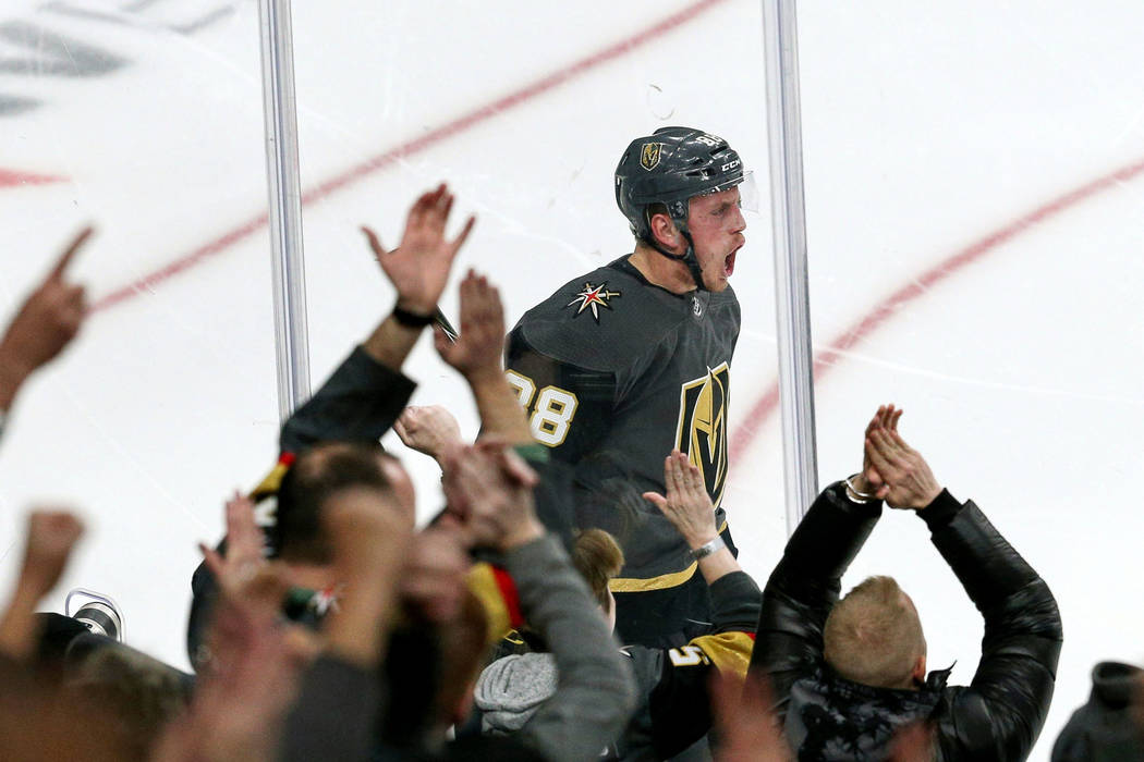 Vegas Golden Knights defenseman Nate Schmidt (88) cheers after scoring against the Boston Bruin ...