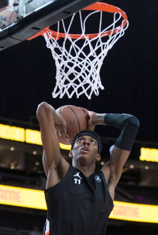 Alonzo Gaffney (11) goes up for a dunk in the first half during the Jordan Brand Classic All-Am ...