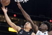 Cole Anthony (50) drives past Isaiah Stewart (33) in the first half during the Jordan Brand Cla ...