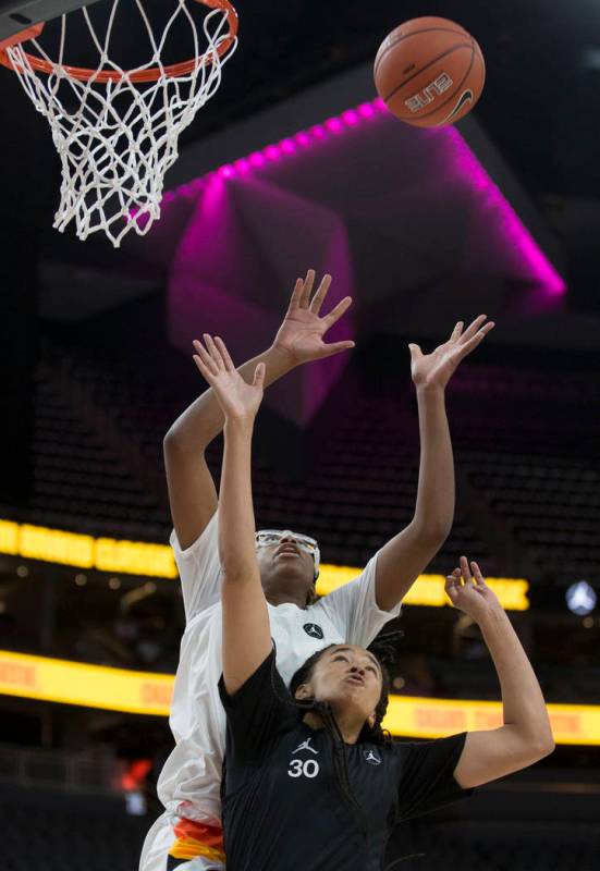 Francesca Belibi (1) attempts a dunk over Haley Jones (30) in the fourth quarter during the Jor ...