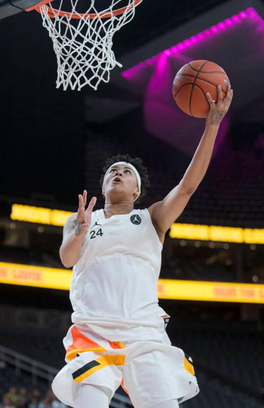 Kierstan Bell (24) drives to the rim in the fourth quarter during the Jordan Brand Classic All- ...