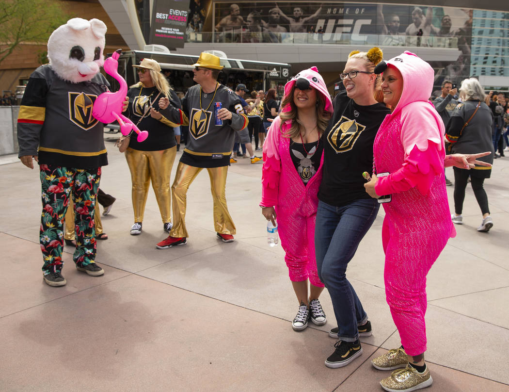 Costumed fans gather before the first period start of Game 6 of an NHL Western Conference quart ...