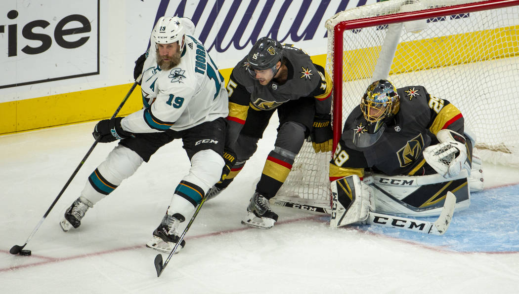 /s19 attempts to turn the corner for a shot over Golden Knights defenseman Jon Merrill (15) an ...