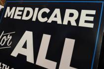 A sign is shown during a news conference April 10, 2019, to reintroduce "Medicare for All" leg ...