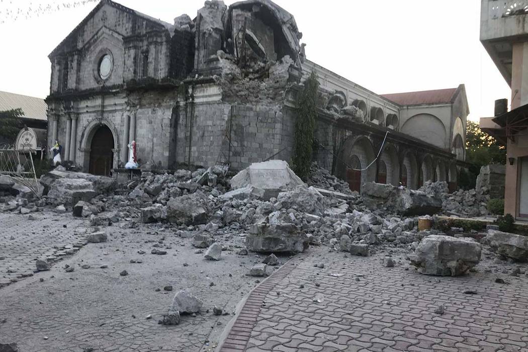 The St. Catherine church is damaged after an earthquake struck Porac town, Pampanga province, n ...