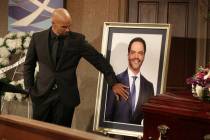 This image released by CBS shows Shemar Moore portraying Malcolm Winters during a funeral scene ...