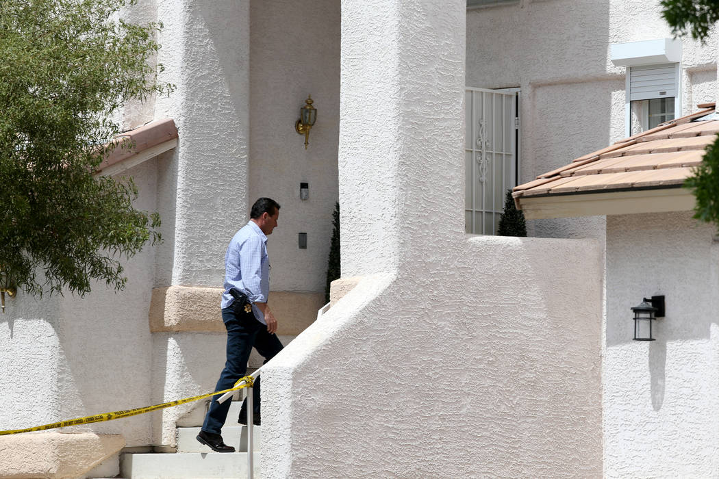 Las Vegas police investigate a homicide in a gated community near near North Durango and West G ...