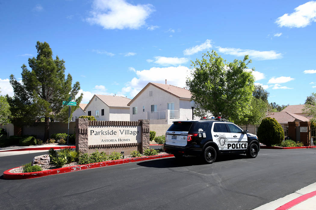 Las Vegas police investigate a homicide in a gated community near near North Durango and West G ...