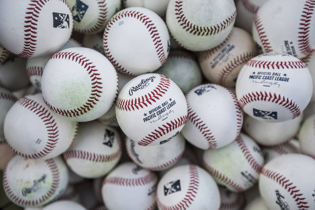 A bin of baseballs used for batting practice at Aviators media day at Las Vegas Ballpark on Tu ...