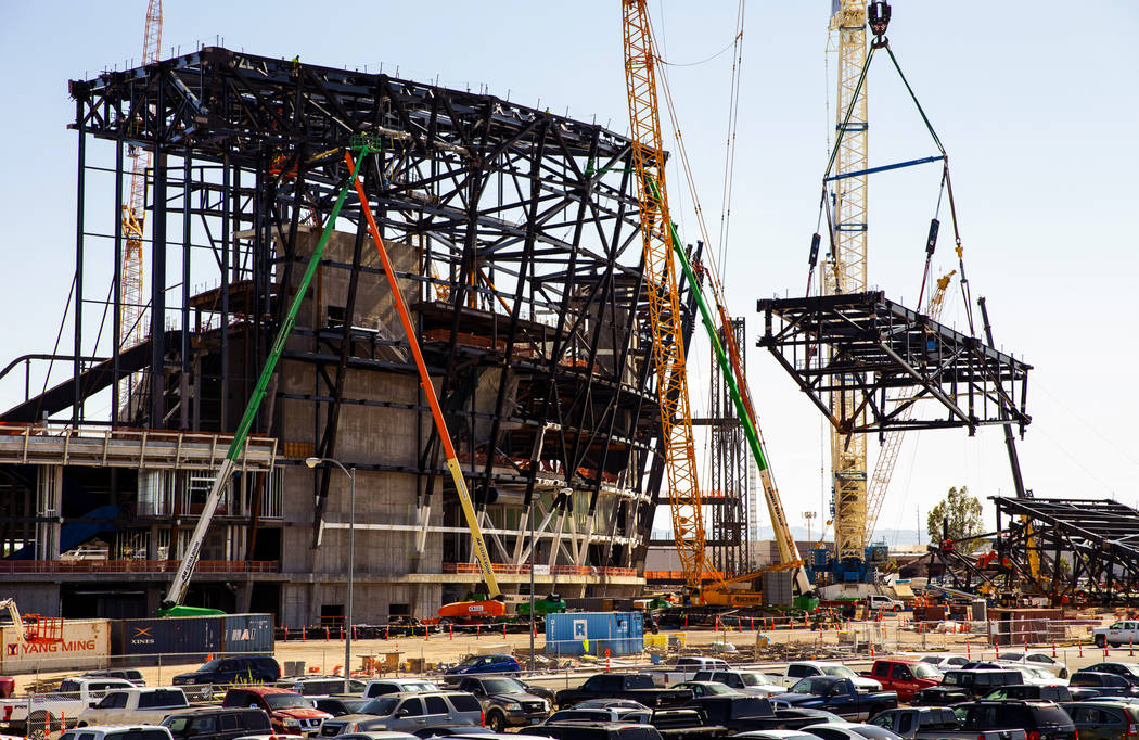 The newest truss is lifted and soon attached to the top of Raiders Stadium on Wednesday, May 1, ...