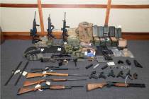 A file image provided by the U.S. District Court in Maryland shows a photo of firearms and ammu ...