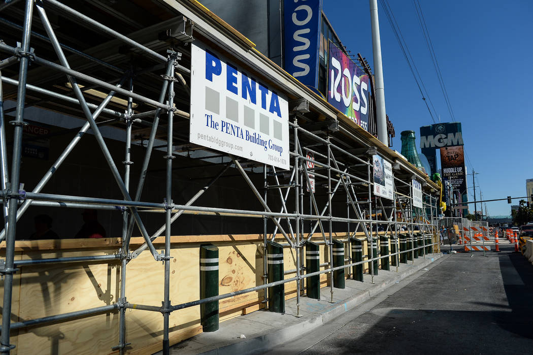 A vacant lot sits next to the Cable center shops on the Las Vegas Strip, Wednesday, April 17, 2 ...