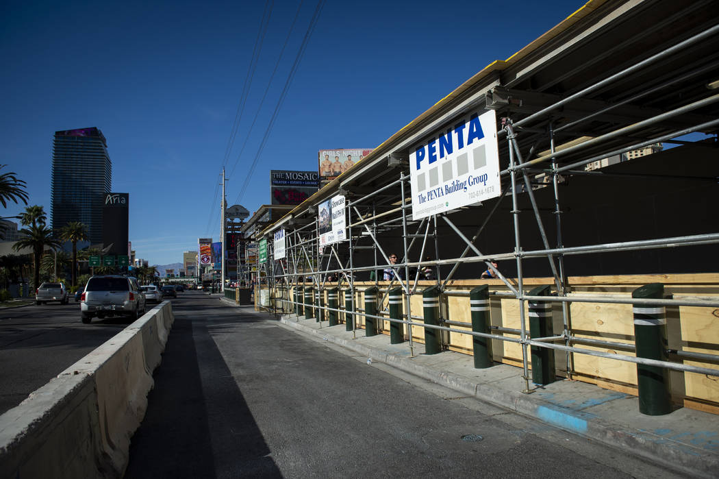 A vacant lot sits next to the Cable center shops on the Las Vegas Strip, Wednesday, April 17, 2 ...