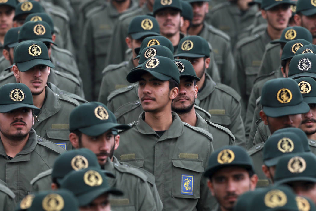 FILE - In this Feb. 11, 2019 file photo, Iranian Revolutionary Guard members attend a ceremony ...