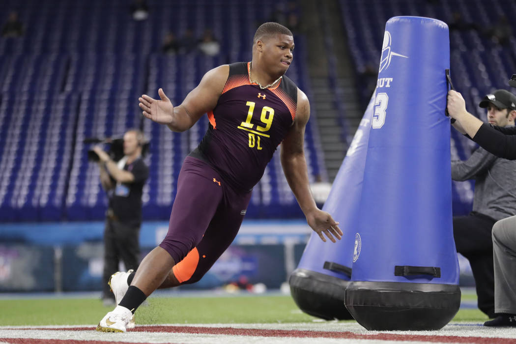 Alabama defensive lineman Quinnen Williams runs a drill at the NFL football scouting combine in ...