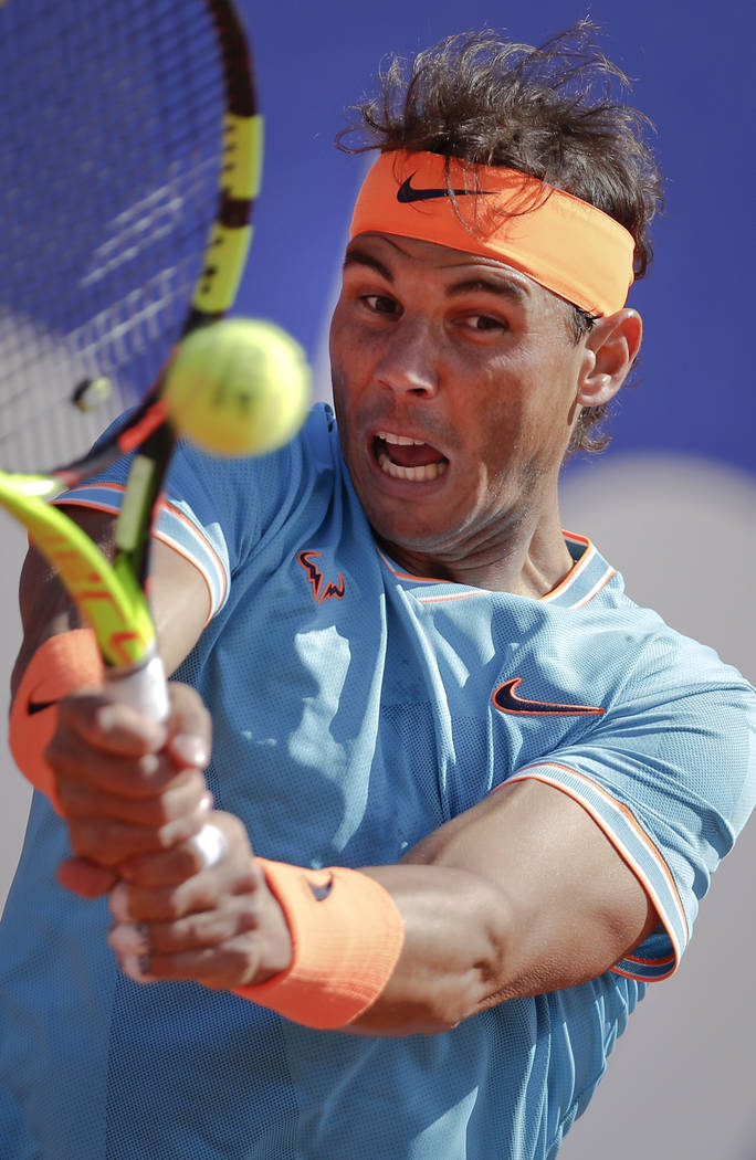 Spain's Rafael Nadal returns the ball against Argentina's Leonardo Mayer during a men's singles ...