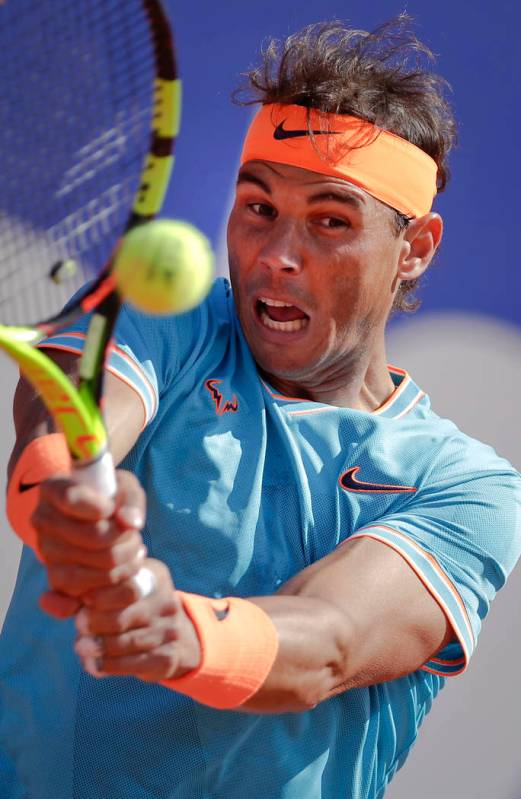 Spain's Rafael Nadal returns the ball against Argentina's Leonardo Mayer during a men's singles ...