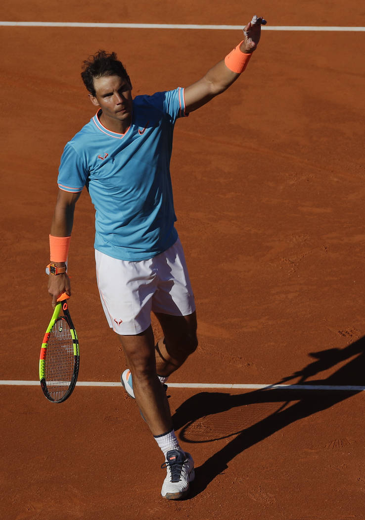 Spain's Rafael Nadal waves to the crowd after winning his men's singles match against Argentina ...