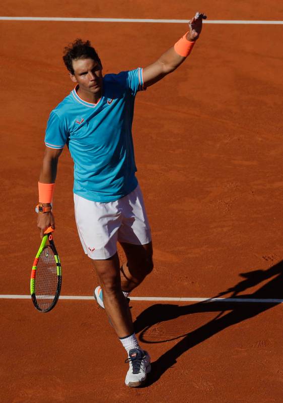 Spain's Rafael Nadal waves to the crowd after winning his men's singles match against Argentina ...