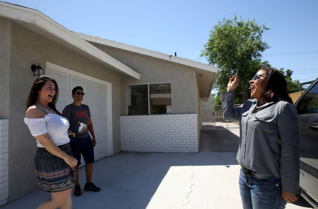 Ana Martinez, a veteran who was homeless two years ago, celebrates the key to her new Las Vegas ...