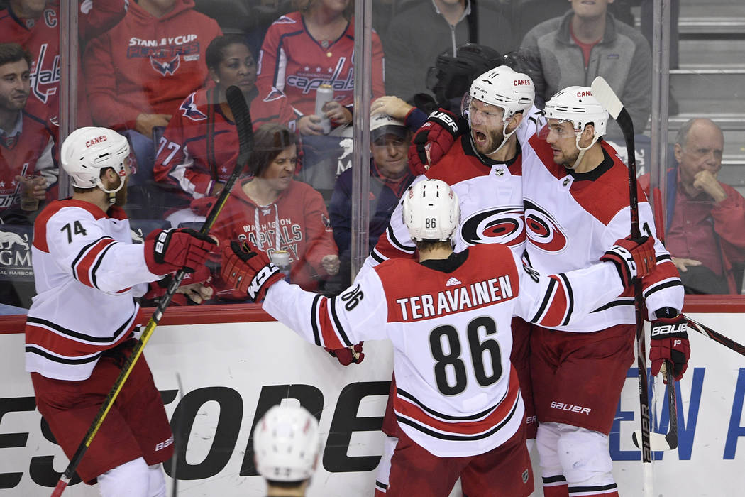 Carolina Hurricanes center Jordan Staal (11) celebrates his goal with right wing Nino Niederrei ...