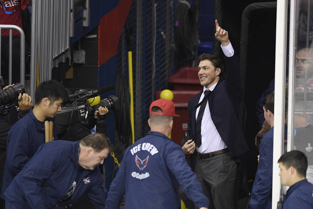 Washington Capitals' T.J. Oshie points as he pumps up the crowd during a break in the action in ...