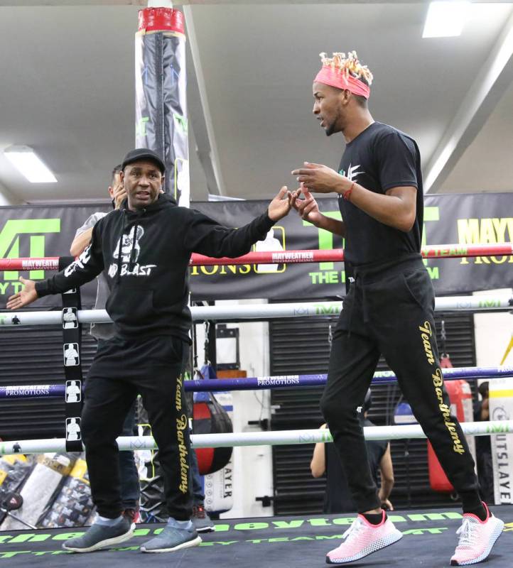 Former two-division world champion Rances Barthelemy works out as his trainer Joel Casamayor, l ...