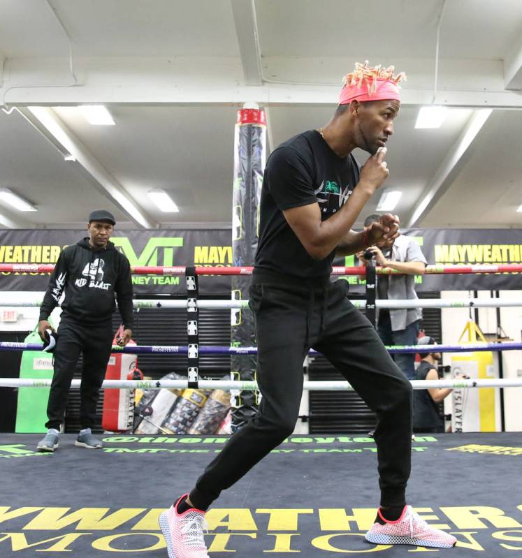 Former two-division world champion Rances Barthelemy works out as his trainer Joel Casamayor, l ...