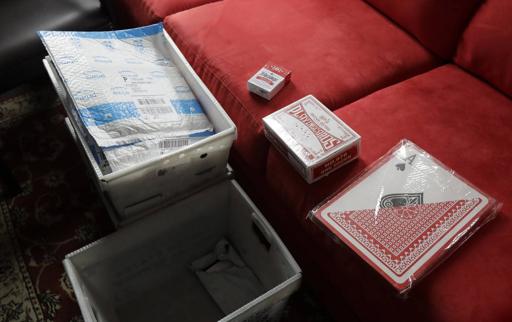 Mail bins containing decks of playing cards are shown in the office of Sen. Maureen Walsh, R-Co ...