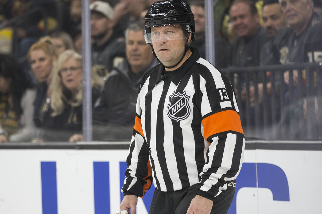 Referee Dan O'Halloran works the Vegas Golden Knights, San Jose Sharks NHL hockey game on Thurs ...