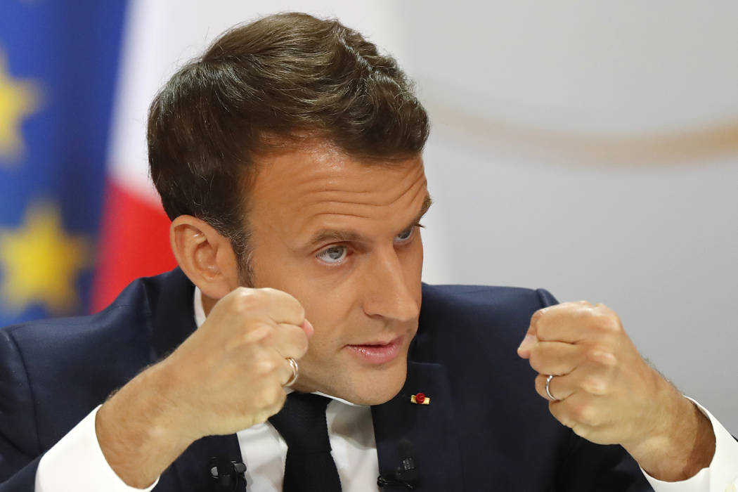 French President Emmanuel Macron delivers a speech at the Elysee Palace Thursday, April 25, 201 ...