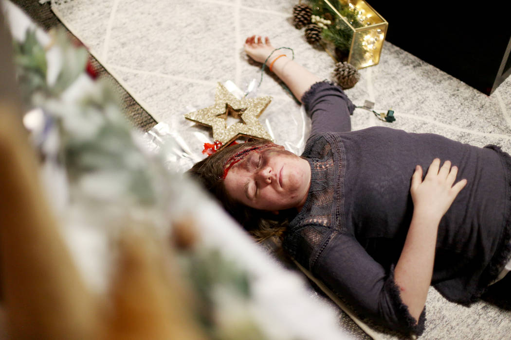 Kelsey Geralds pretends to be dead for a fake crime scene that allows kids of city employees to ...