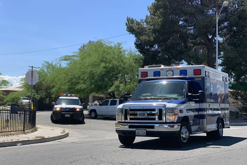 Las Vegas police and medical personnel respond to a shooting on the 3200 block of Silver Saddle ...