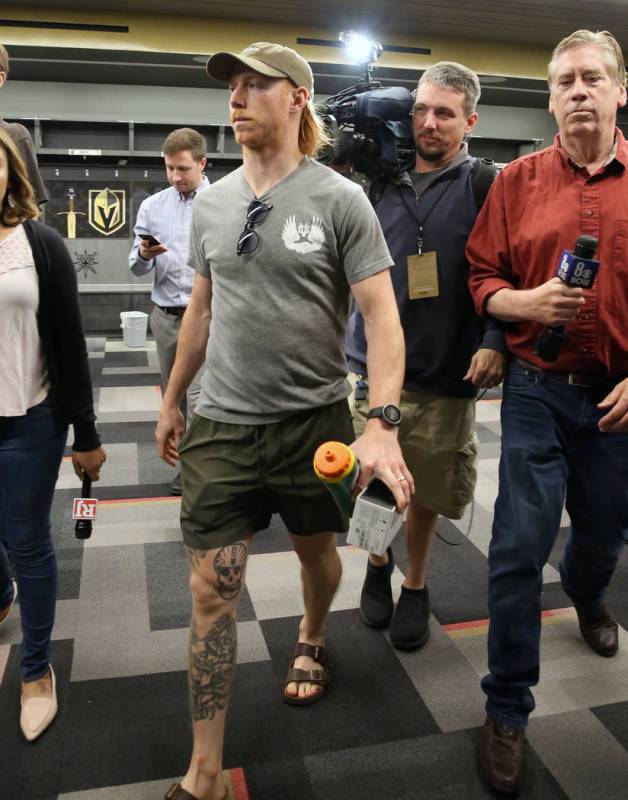 Golden Knights center Cody Eakin enters team's locker room to address the media at City Nationa ...