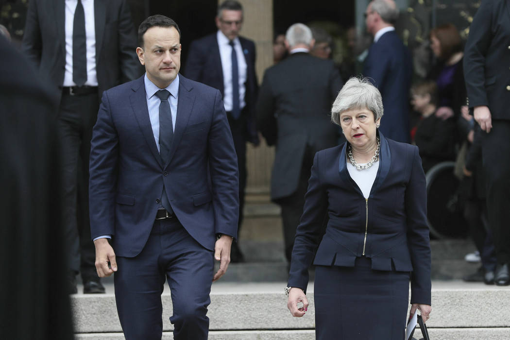 Britain's Prime Minister Theresa May, right and Ireland Prime Minister Leo Varadkar leave after ...