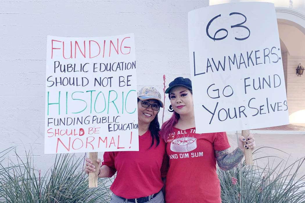 Imelda Suppe, a 56-year-old special education teacher at Helen Herr Elementary School, left, an ...