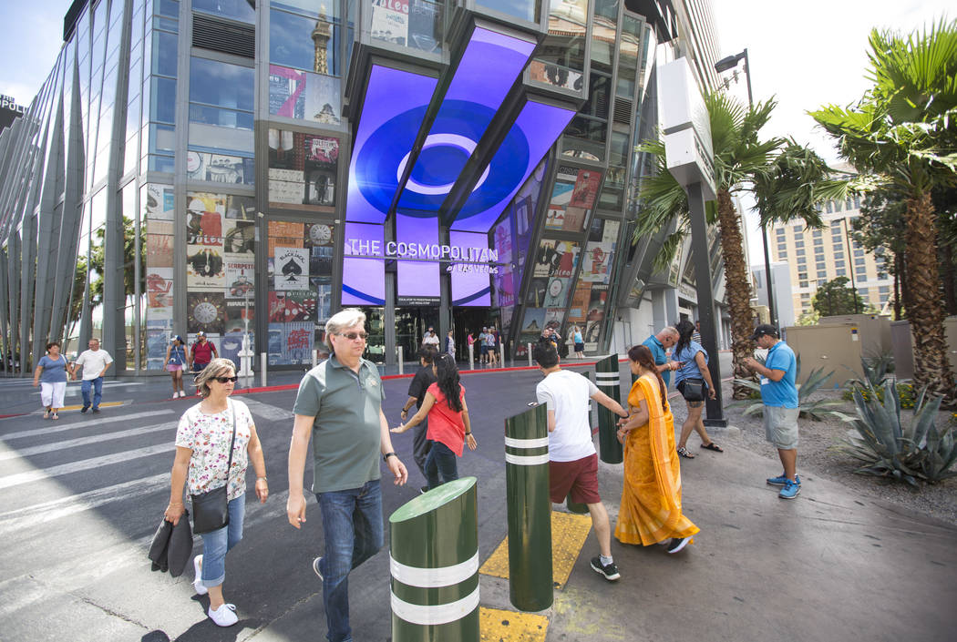 People walk outside The Cosmopolitan of Las Vegas on the Strip. (Richard Brian/Las Vegas Review ...