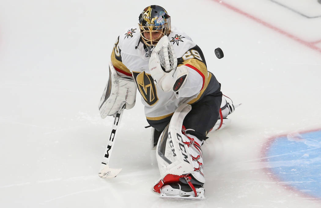 Golden Knights goaltender Marc-Andre Fleury (29) makes a save in the second period during Game ...