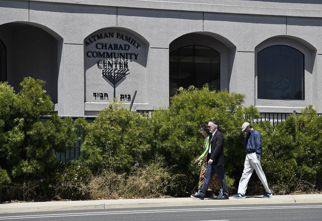 Synagogue members walk outside of the Chabad of Poway Synagogue Saturday, April 27, 2019, in Po ...