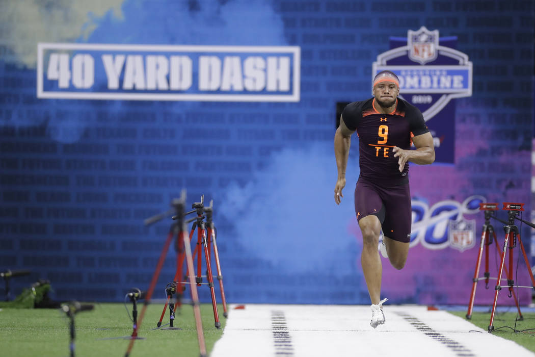 Notre Dame tight end Alize Mack runs the 40-yard dash during the NFL football scouting combine, ...