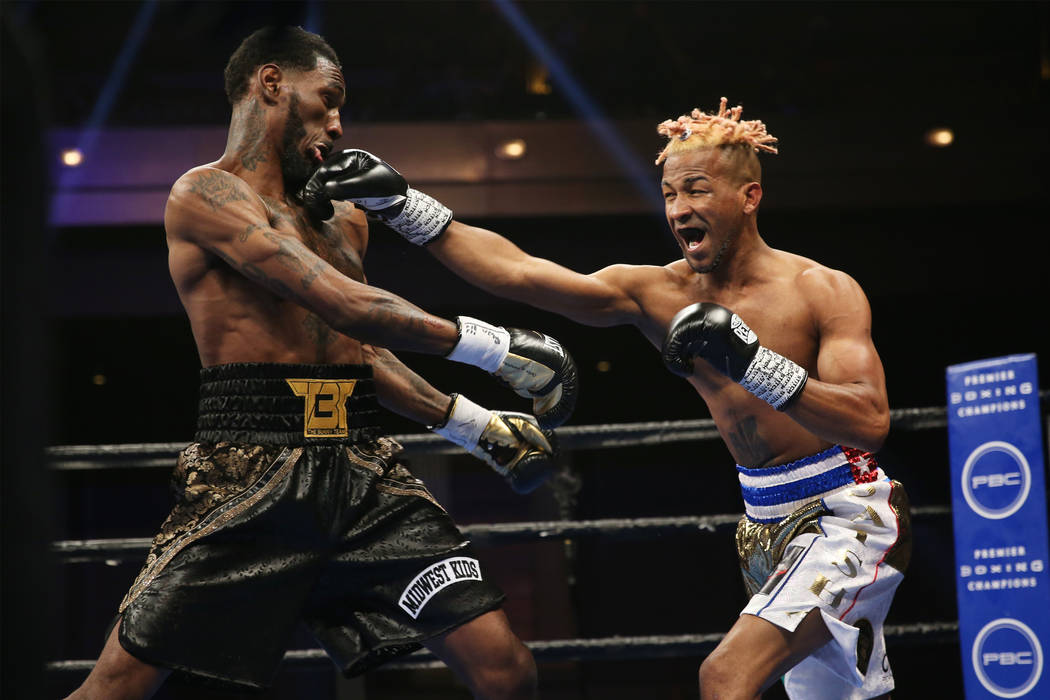 Rances Barthelemy, right, connects a punch against Robert Easter Jr. in the WBA lightweight cha ...