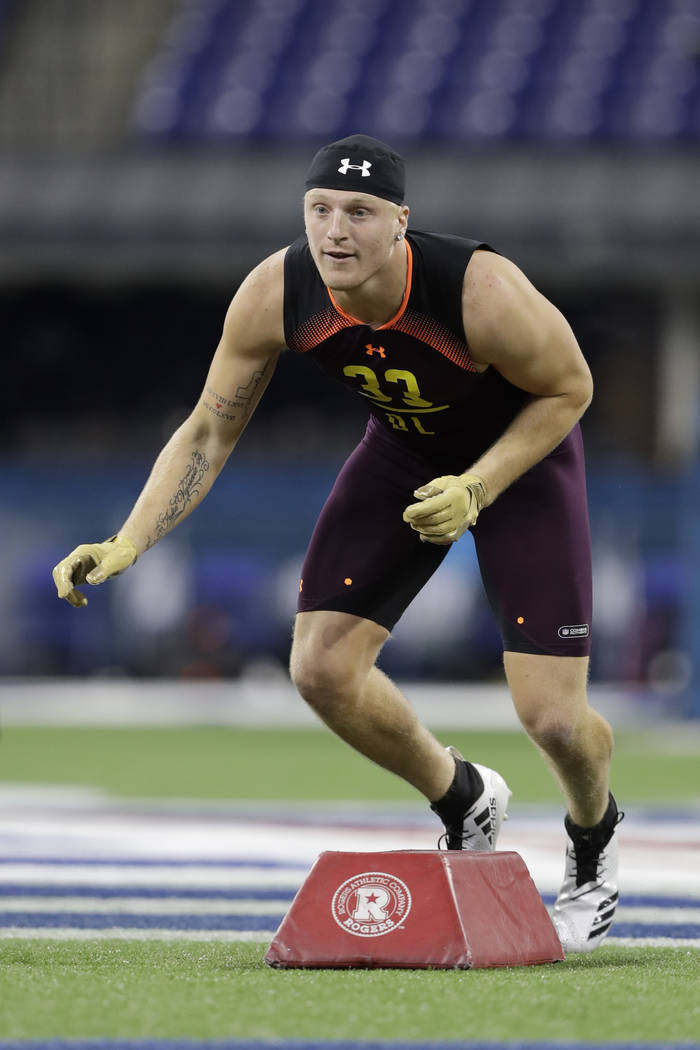 Eastern Michigan defensive lineman Maxx Crosby runs a drill during the NFL football scouting co ...