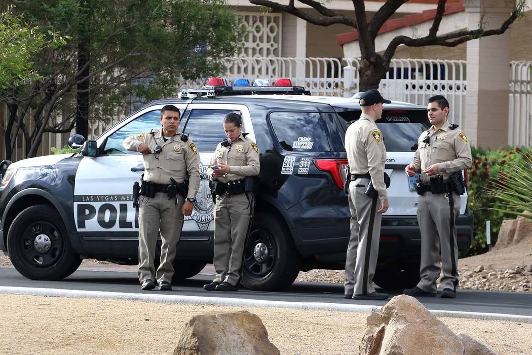 Las Vegas police are seen at St. Viator Parish School in Las Vegas at Eastern Avenue and Flamin ...