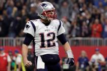 New England Patriots' Tom Brady celebrates a touchdown during the second half of the NFL Super ...