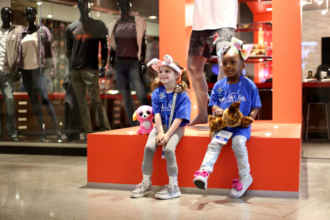 Judy Haynes, 4, poses with Gia Adams, 4, at an event hosted by Make-A-Wish in partnership with ...