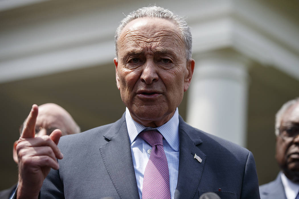 Senate Minority Leader Sen. Chuck Schumer of N.Y., speaks with reporters after meeting with Pre ...