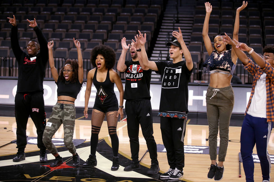 Members of the WNBA Las Vegas Aces Wild Card Crew, from left, Jeremiah Williams, 19, of Las Veg ...